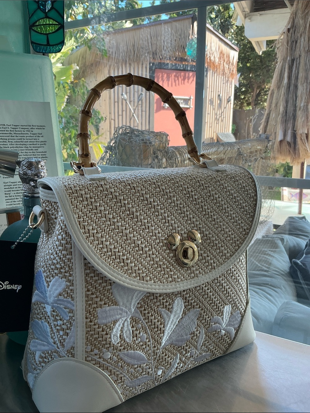 Our Universe Disney Floral/Straw Pom-Pom bag, bamboo handle, never used!